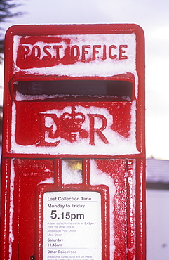 Snow on  a postbox in Keswick, Cumbria, England, United Kingdom, Europe