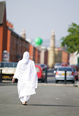 A Muslim woman in a Pakistani area of Blackburn, Lancashire, England, United Kingdom, Europe