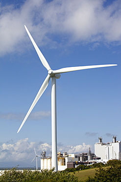 A 2 MW wind turbine producing renewable electricity in the grounds of the Eastman factory on the outskirts of Workington, Cumbria, England, United Kingdom, Europe