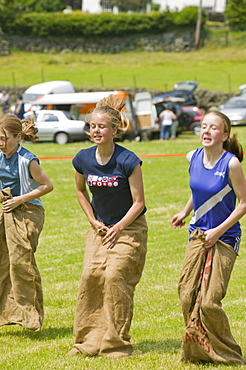 A sack race at the Langdale Gala, Lake District, Cumbria, England, United Kingdom, Europe