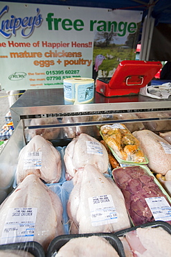 Locally reared free range chickens on a farmers market in Kendal, Cumbria, England, United Kingdom, Europe