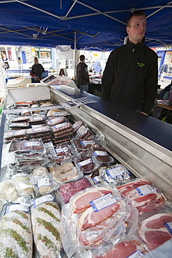 Meat products on a farmers market in Kendal, Cumbria, England, United Kingdom, Europe