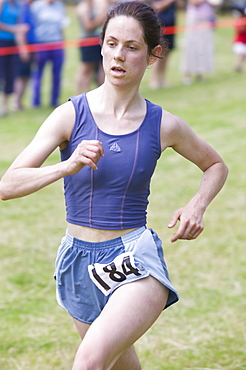 A fell runner in a fell race in the Lake District, Cumbria, England, United Kingdom, Europe