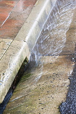 Rain running down the gutter in Jindabyne, New South Wales, Australia, Pacific