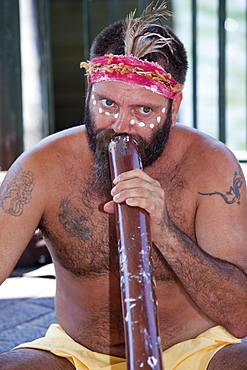 An Aboriginal man playing the didgeridoo in Sydney, New South Wales, Australia, Pacific