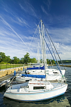 Boats moored at the Low Wood on Windermere Lake District UK