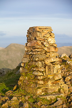 A trig point on the summit of Red Screes in the Lake District, Cumbria, England, United Kingdom, Europe