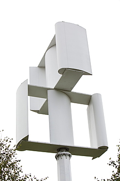 A vertical axis wind turbine in the grounds of a Tesco supermarket in Oldham, Lancashire, England, United Kingdom, Europe