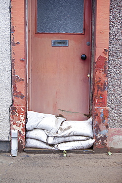 A house door in Workington that was inundated by floodwater, Cumbria, England, United Kingdom, Europe