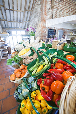 Home grown produce for sale at a farm shop in an old barn on a farm near Holt, Norfolk, England, United Kingdom, Europe