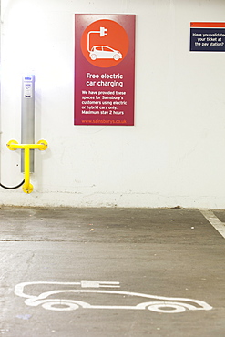 An electric vehicle charging station provided free of charge for customers at Camden Sainsbury's supermarket in London, England, United Kingdom, Europe