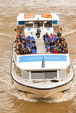 A tourist boat trip on the River Thames in London, England, United Kingdom, Europe