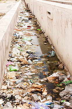 A rubbished contaminated water course in Marrakech, Morocco, North Africa, Africa