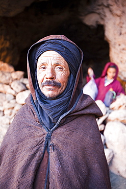 Berber shepherd in cave shelter for goats and sheep in the Anti Atlas mountains of Morocco, North Africa, Africa