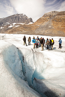 Meltwater channels and tourists on the Athabasca Glacier, Jasper National Park, UNESCO World Heritage Site, Alberta, Canadian Rockies, Canada, North America