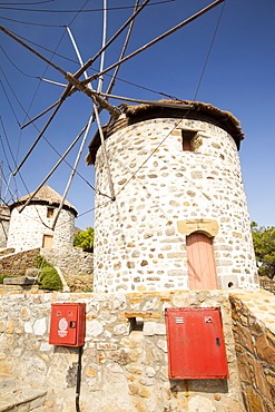 Old traditional Greek cloth-sailed windmills in Kontias on Lemnos, Greek Islands, Greece, Europe