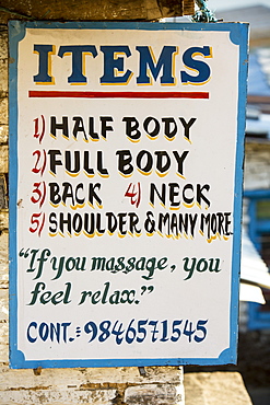 A sign for massage at a tea house lodge on the Annapurna Base Camp trek, Himalayas, Nepal, Asia