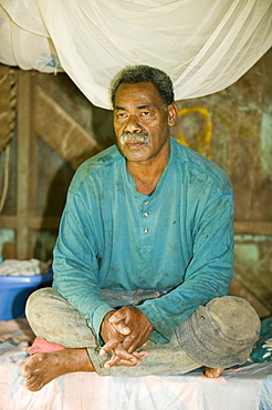 A Fijian man in Bukaya in the Fijian highlands, Fiji, Pacific