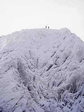 Climbers on Cairn Lochain on the Cairngorm plateau from Coire an Sneachda, Scotland, United Kingdom, Europe