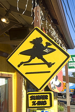 Surfer crossing logo, Surf 'n Sea surf shop, Haleiwa, North shore, Oahu, Hawaii, United States of America, Pacific