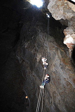 People rappeling up the Anhumas Abyss, Bonito, Mato Grosso do Sul, Brazil, South America