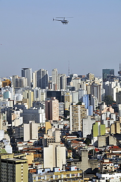 Sao Paulo and helicopter, view from the rooftop of Italia Building, Brazil, South America