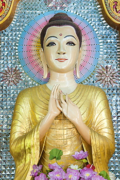 decorative monk statue, sitting, Dhammikarama Burmese Temple.  George Town, Thailand, Asia