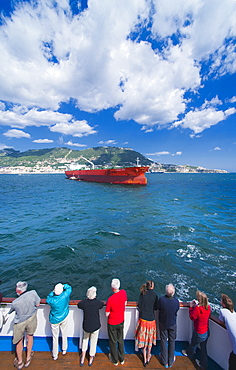 12/04/2009. United Kingdom, City of Gibraltar, Rock of Gibraltar, entering harbour of Gibraltar, ships, cargo ships . City Of Gibraltar, St Michalel's Cave, Gibraltar Strait . UK, United Kingdom