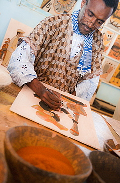 01/04/2009, Sand Painting Gallery, man sand painting, glue and colour sand used for craft art. Dakar , YMCA City Center, Cape Verde Peninsula. Senegal