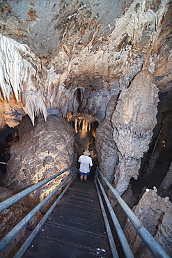 Male tourist visiting the Windy Cave, Mulu National Park, Sarawak, Malaysia