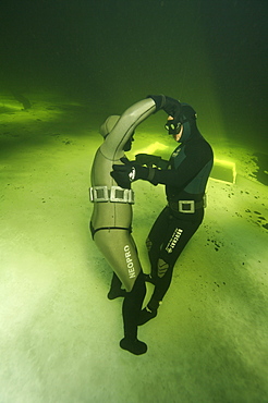 Freediving under the ice in Northern Russia in the White Sea. White Sea, Russia