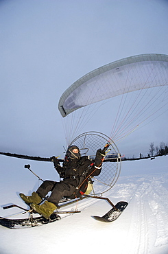 Olof Heikka a sami reindeer herdsman  on his paramotor