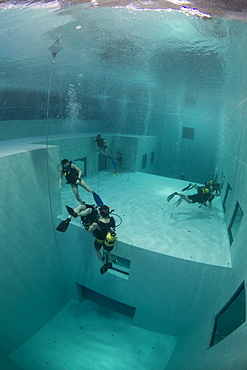 Divers in Nemon 33 pool, the deepest swimming pool in Europe, Belguim, Europe