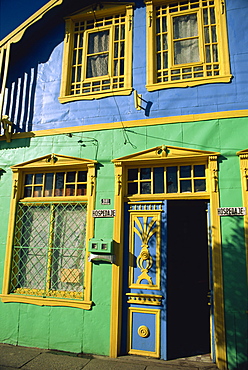 Detail of painted building facade, Castro, Chiloe Island, Chile, South America