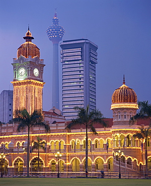 The Sultan Abdul Samad Building, formerly the Secretariat, illuminated at dusk, seen from Merdaka Square, Kuala Lumpur, Malaysia, Southeast Asia, Asia