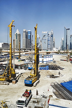 Construction is all around The Burj Khalifa, the worlds tallest building in downtown Dubai, United Arab Emirates, Middle East