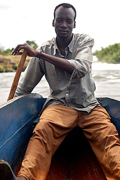 Bujagali Falls is a waterfall near Jinja in Uganda where the Nile River comes out of Lake Victoria, sometimes considered the source of the Nile.  This is a very popular tourist attraction for people wanting to raft on the white water rapids. Bujagali Falls, Jinja, Uganda, East Africa