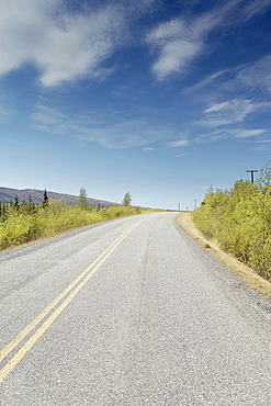 Open road going over the hill.  Stampede road, linking to Stampede Trail, made famous in 1992 by the adventures of Chris McCandless, who also dies on the Trail. Denali, Alaska, USA