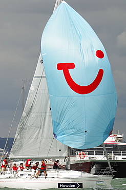 Action dropping the Spinnaker at Skandia Cowes Week 2008 Finish Line