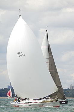 Action dropping the Spinnaker at Skandia Cowes Week 2008 Finish Line