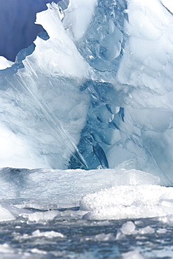 Detail of ice calved from Storpollen Glacier, on the southwestern side of Spitsbergen Island in the Svalbard Archipelago, Barents Sea, Norway.