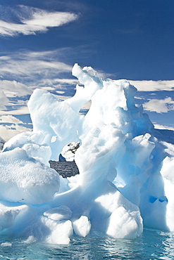 Iceberg detail in and around the Antarctic Peninsula during the summer months. More icebergs are being created as global warming is causing the breakup of major ice shelves and glaciers.