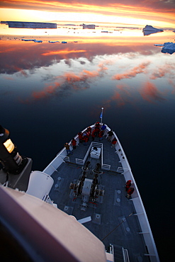 A view from the crow's nest of tNational Geographic Endeavourat sunset in the Weddell Sea, Antarctica.