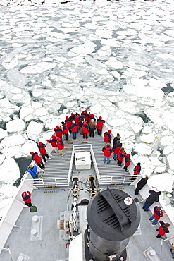 A view from the crows nest of the Lindblad expedition ship National Geographic Endeavour operating in Port Foster, Deception Island, South Shetland Island Group, Antarctica