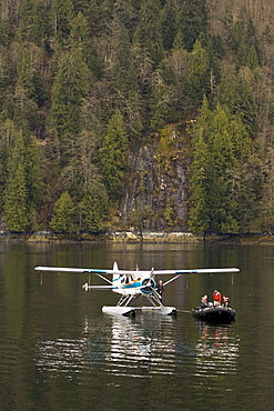 Float Planes operating in southeast Alaska, USA, Pacific Ocean. The float plane is one of the most common ways to travel in the calm waters of the inside passage and throughout Alaska.