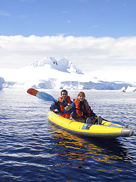 Guests from the Lindblad Expedition ship National Geographic Explorer kayaking in and around the Antarctic Peninsula in the summer months.