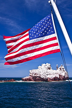 The American flag flying from the Lindblad Expedition ship National Geographic Sea Lion at Los Islotes in the Gulf of California (Sea of Cortez) just outside of La Paz, Baja California Sur, Mexico. 