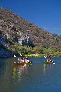 Kayaking in a brackish lagoon along the Baja Peninsula in the Gulf of California (Sea of Cortez), Baja California Norte, Mexico. No model or property releases for this image. 