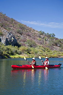 Kayaking in a brackish lagoon along the Baja Peninsula in the Gulf of California (Sea of Cortez), Baja California Norte, Mexico. No model or property releases for this image. 