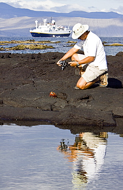 Staff from the Lindblad Expedition ship National Geographic Endeavour doing various things in and around the Galapagos Islands, Ecuador. No property or model releases are available for this image.